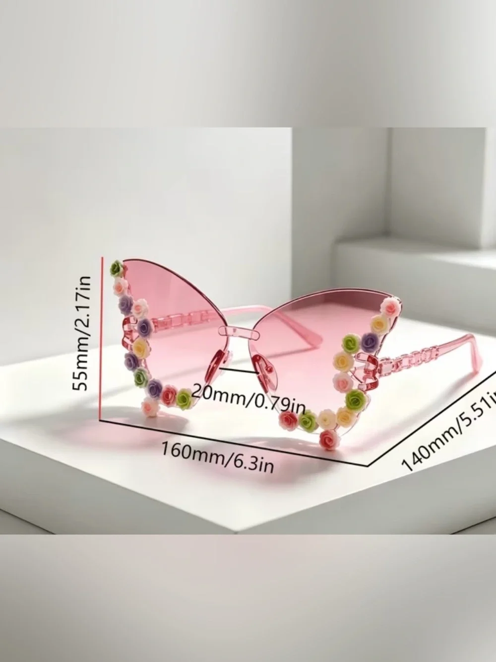 NWT Butterfly wing sunglasses (resin) feature a vibrant pink-to-yellow gradient